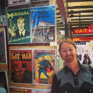 Glenno - standing next to bootleg Tin Tin print